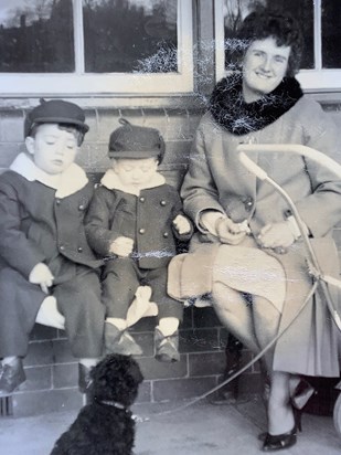 Mum with Paul and Kevin. Glad I was not in this one.  Nice clothes big brothers!