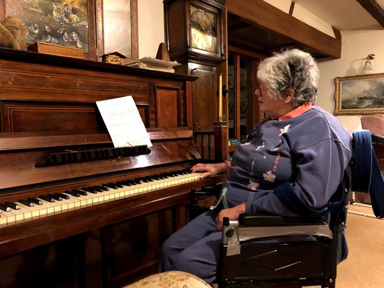 Grandma playing some piano