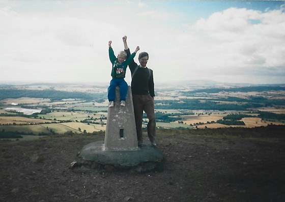 Tony helps nephew James to his first peak. The Wrekin circa 1989.