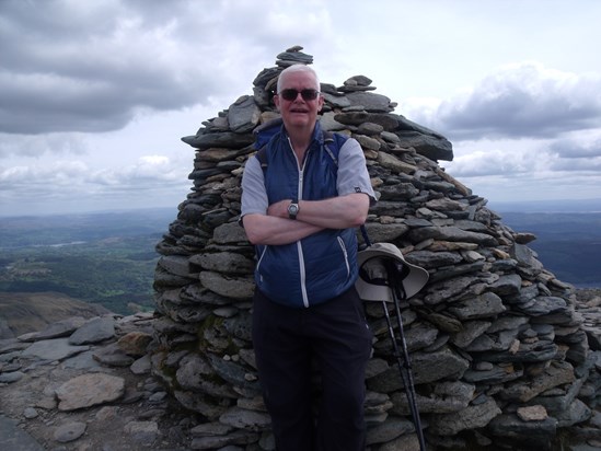 Tony in his element - at the top of a mountain.