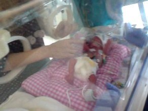 Mummy Touching Wee Elle's Hand
