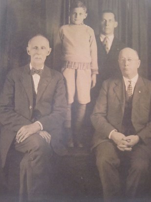 Four generations - Norm as a boy with father Manley, grandpa William, and great grandpa Joshua