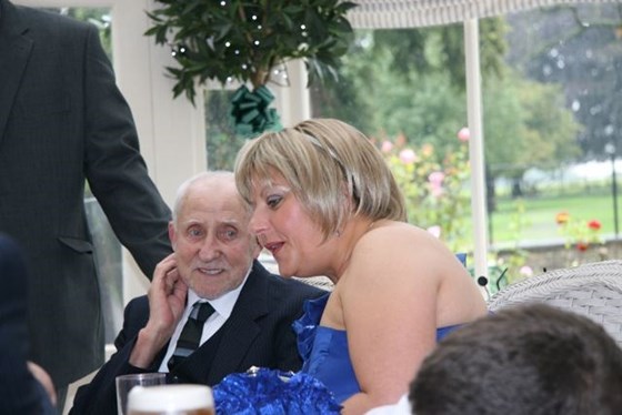 angela and her grandad at brother Kevin's wedding in August 2011