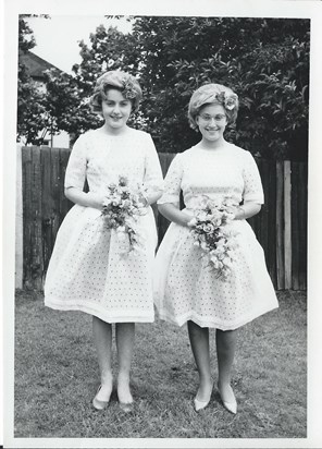 Maggie (right) and her cousin Gill, as bridesmaids at Pat and Peter's wedding