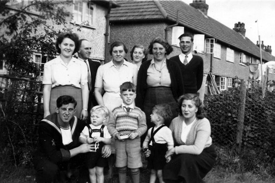 1950ish Margaret (at centre rear) with parents, siblings and first nephews in Chester Avenue back garden
