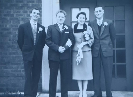 Stella and Stan's wedding day, with best man Fred and brother Levi