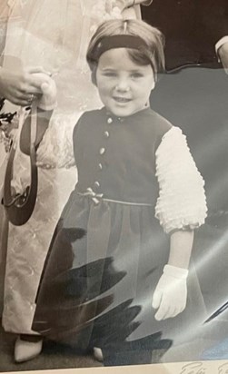 A photograph of Mary at 4 when she was our flowergirl in a red velvet dress. Gone too soon but will be remembered by all who knew her with love. RIP! 