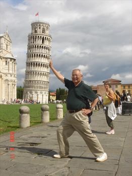 2006 Europe trip - holding against Leaning Tower of Pisa