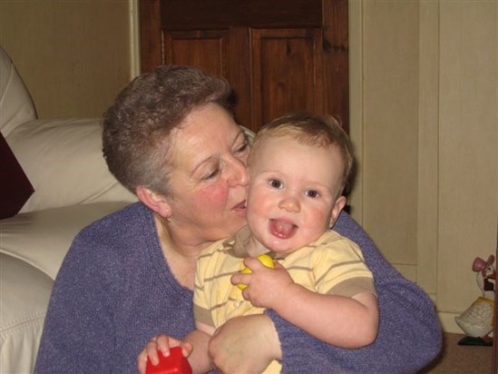 Cuddles with grandson Connor