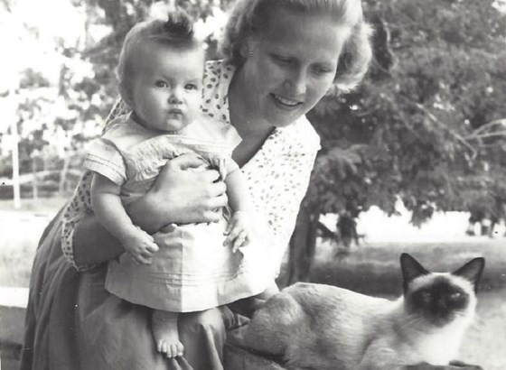 Nancy with her daughter, Catherine, and their cat, Ping