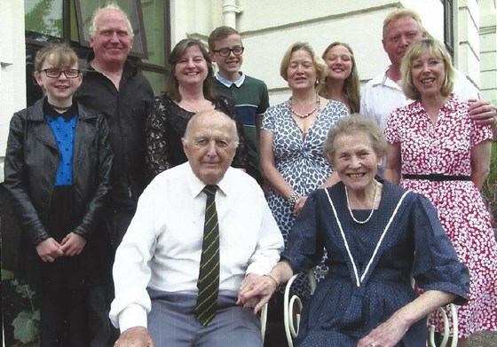 Nancy and Michael celebrating their 60th wedding anniversary with their family