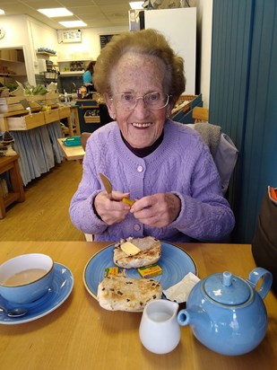 Mum enjoying a teacake in Brixham