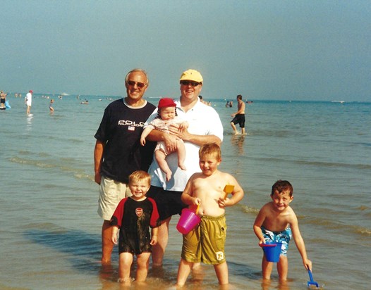 Michael Snr with Michael Jr and his four boys