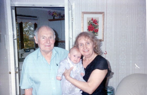 John and Ambrosine with Grandchild Cara