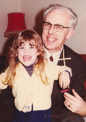 Colin with first grandchild Katy, 1982