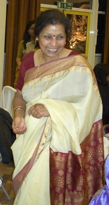 In her element, at one of the many Durga Pujo celebrations