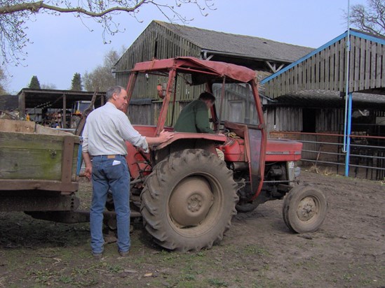 IM000022 Ian checking surroundings clear before giving Alex(MFT) tractor lesson at Old Hall  2009