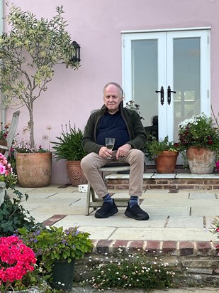 Mike watching the dogs play in his daughter Jess's garden this Summer