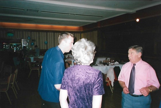 Tom, Mum and Uncle Ken enjoying a dance 