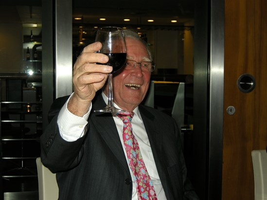 Hughie raising a glass to the winner of the 2008 Loud Tie competition 2008