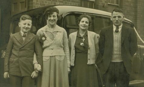 Dennis with his mum and dad aged approx 11