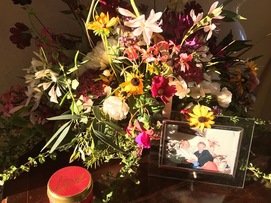 Last of the summer sun, shining on Mum and Dad and flowers from her garden.