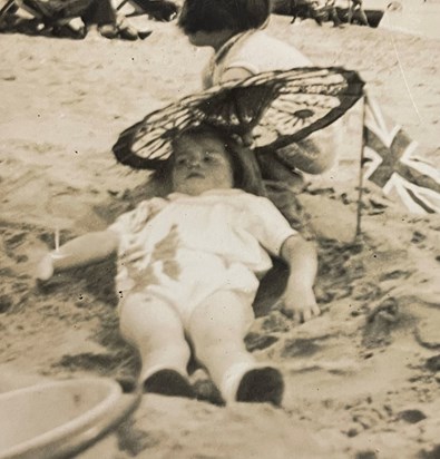 A young Diana enjoying the beach.