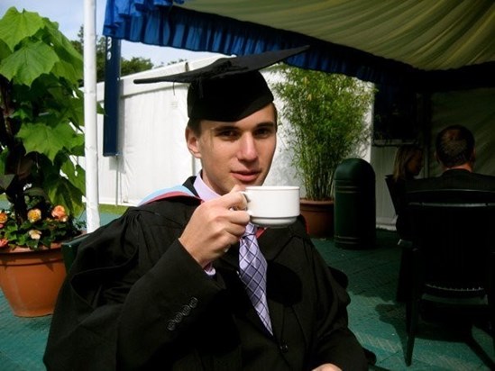 Having a cuppa after his graduation!
