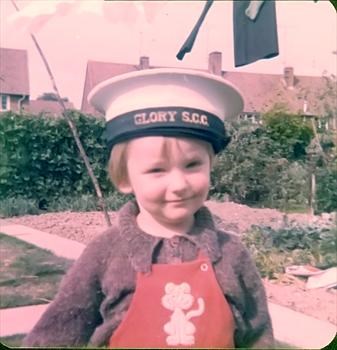 Ricky with big brother Derek's sea cadet hat on
