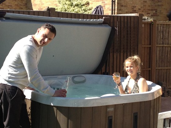 In the hot tub at Nat Nat and Grandad's house pictured with Uncle Brett 2013