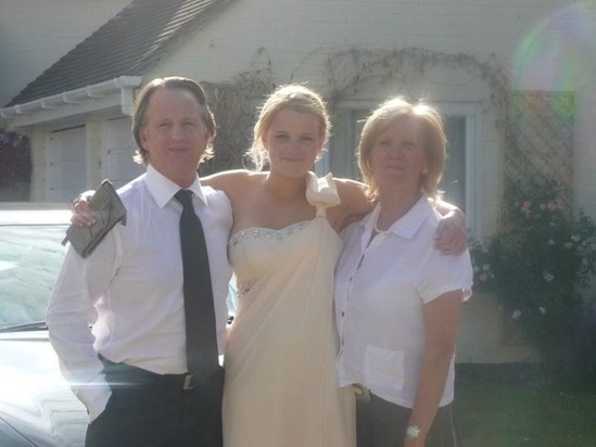 Rose with her Nat Nat and Grandad before her prom 