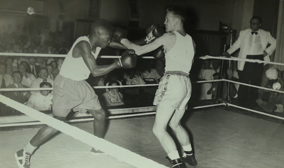 Boxing during his time in the Royal Navy.