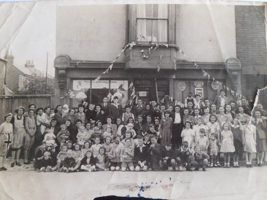 Durham Street VJ Day Party Aug 1945 (Mervyn is held by his mum 5th from left)