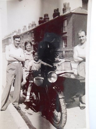 Mervyn and Malcolm on their dad's motorcycle (with cousin Glenna)