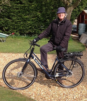 Dad on his trusty electric bike