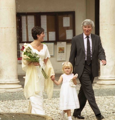 My wedding day. Dad making me laugh as we walk into the Comune. 