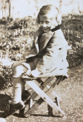 Mum as a young girl ... in the garden, of course!