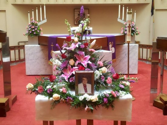 Memorial flowers in the sanctuary at Christ Lutheran Church
