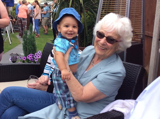 Joan having fun with the youngest great great nephew (at the time) of the family