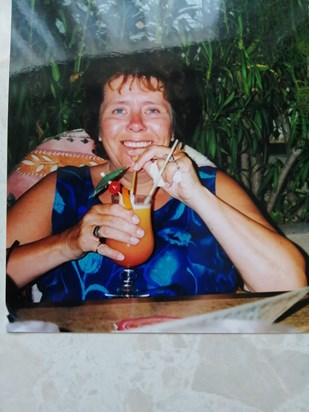 My Dear sister Linda enjoying a cocktail on one of our lovely holidays lots of lovely memories will miss you always xx 