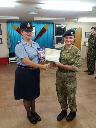 Look daddy!! Our Lucy getting cadet of the month award, and she has just passed her senior cadet exams!!