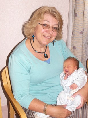 Sue just after her grandson Leo was born