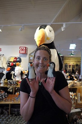 Sophie loving the soft toy display of puffins in a gift shop, Iceland, 2013