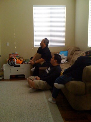 Kirk and Jeff watching me (Victor) fail miserably on XBOX!!