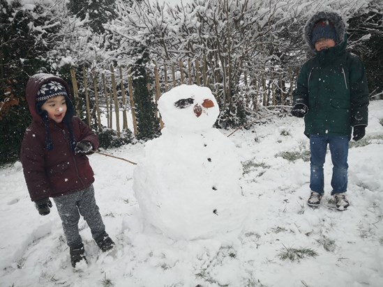 Eamon and Connor make a snowman during Nanna's last Christmas.