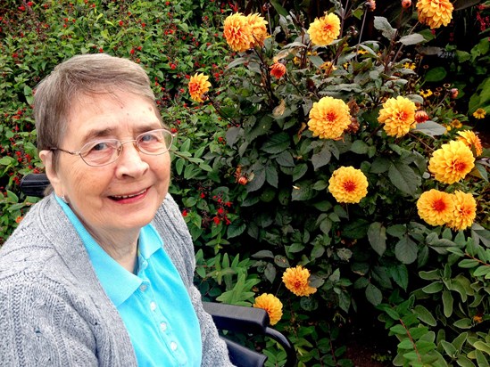 Cynthia enjoying the flowers