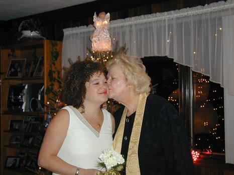 Sarah being congratulated by Ann Louise, December 2003