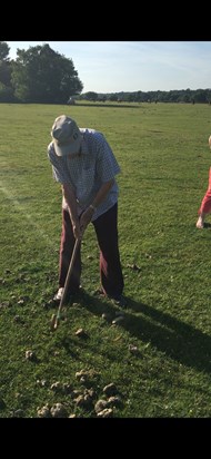 MP taking a swing whilst making use of natural resources! 