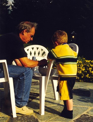 Alex helping Dad with the beans