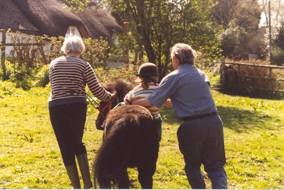 Emma (almost) horseriding with Mum & Dad